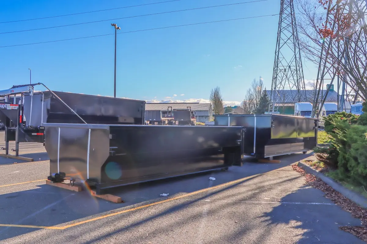 Roll-off dumpster ready for waste disposal at job site for 3 Yard Dumpster Rental in Goddard